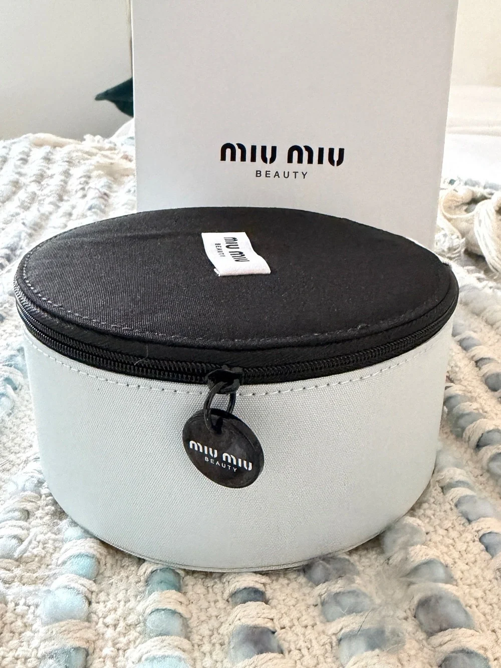 Miu Miu compact round